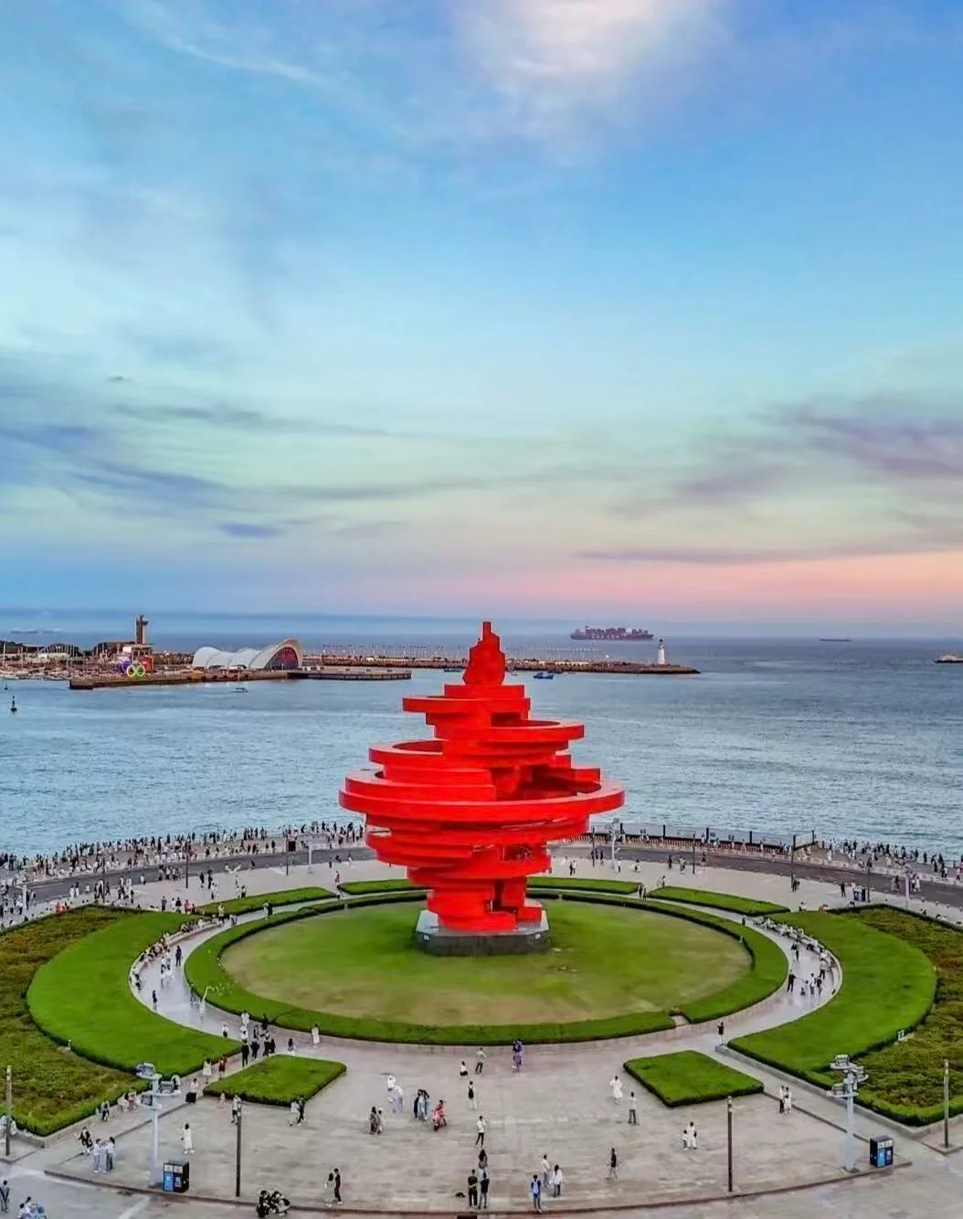 Red sculpture beside the seafront