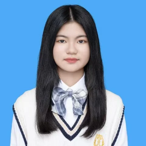 Portrait of a woman against a blue background